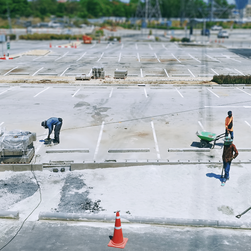 Parking lot with reinforced concrete surface
